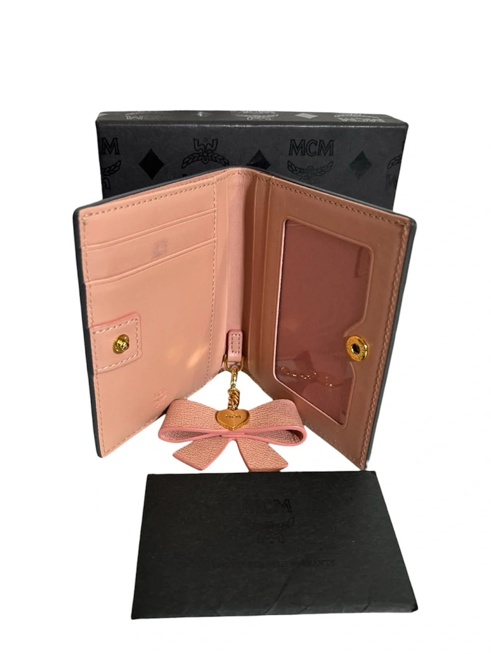 MCM Black Leather Bifold Wallet with Pink Bow Charm and Gold Logo